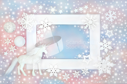 Image of Christmas Unicorn Snowflakes and White Decorations Background 
