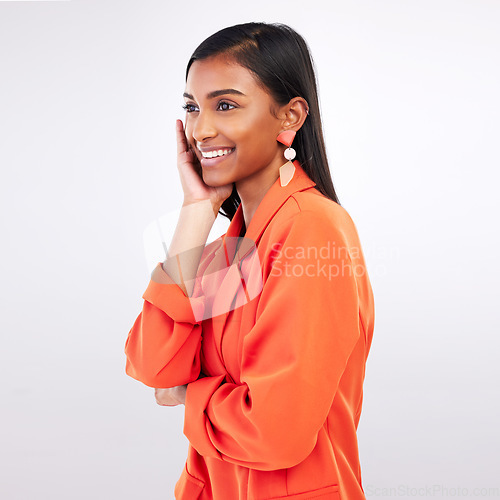 Image of Fashion, smile and young woman in a studio with a classy, formal and stylish blazer outfit. Confidence, beauty and happy Indian female model with elegant business style isolated by white background.