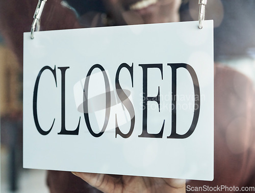 Image of Closed, sign and window of a coffee shop closeup for small business commerce or service in the food and beverage industry. Cafe, glass and poster for retail or hospitality at a startup restaurant