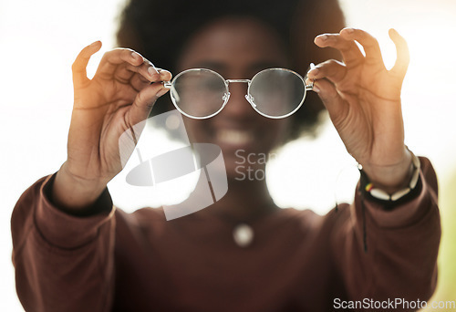 Image of Woman, hands and closeup of glasses for vision, prescription lens for fashion and eyesight. Frame, optometry and person with optical eyewear for eye care, ophthalmology and health in optician test