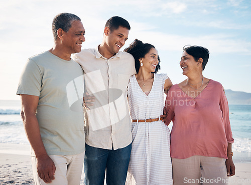 Image of Ocean, senior parents and adult children together with smile, love and hug on summer holiday in Mexico. Embrace, happy family support and mature mom, dad and couple on beach vacation travel in nature