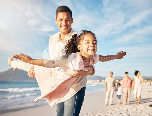 Image of Smile, beach and father doing airplane with girl having fun on family vacation or holiday. Happy, travel and young dad playing and bonding with child by ocean on adventure or weekend trip together.