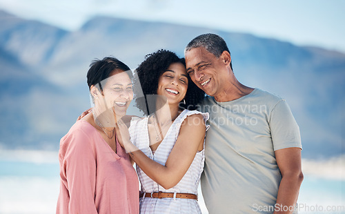 Image of Beach, senior parents and adult daughter together with smile, love and hug on summer holiday in Mexico. Embrace, happy family support and mature mom, dad and woman on ocean holiday travel in nature.