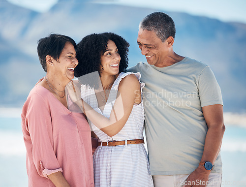 Image of Ocean, senior parents and adult daughter together with smile, love and hug on summer holiday in Mexico. Embrace, happy family support and mature mom, dad and woman on beach holiday travel in nature.