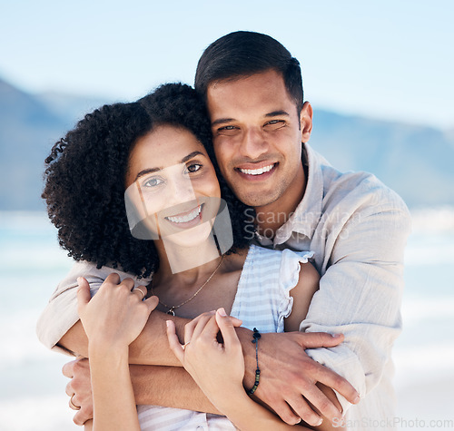 Image of Happy, couple and portrait on beach in Brazil holiday, vacation or travel for summer break at the ocean, waves or sea. People, smile and love a tropical adventure together for honeymoon or marriage