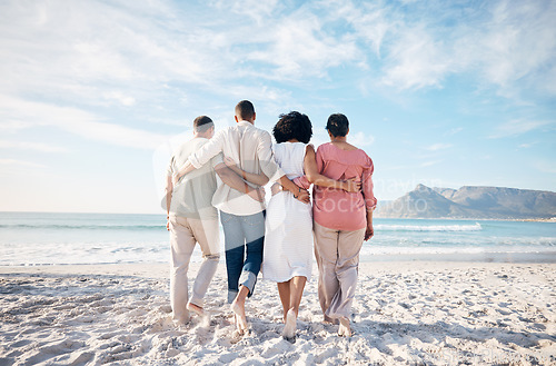 Image of Back, hug and family at the beach for vacation, travel or relax by the ocean on holiday. Together, care and parents with adult people at the sea during summer for walking, love or support in nature