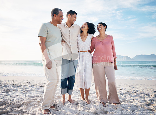 Image of Sea, senior parents and adult children together with smile, love and hug on summer holiday in Mexico. Embrace, happy family support and mature mother, father and generations on beach vacation travel.