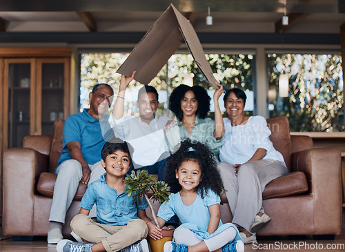 Image of Happy family, children and grandparents for home insurance, investment and safety or growth with mom and dad. Kids on floor, interracial people and cardboard roof, house cover and security portrait