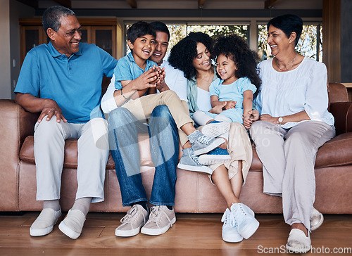 Image of Happy, funny and relax with big family on sofa for smile, bonding and peace. Love, generations and grandparents with parents and children in living room at home for vacation, cuddle and embrace