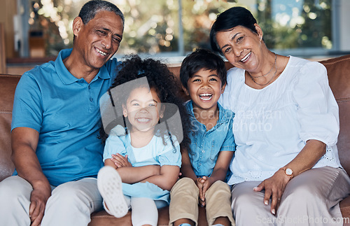 Image of Happy, portrait and grandparents with children on sofa for smile, bonding and peace on holiday. Love, care and happiness with family in living room at home for vacation, cuddle and embrace together