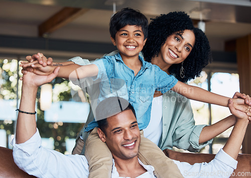 Image of Smile, airplane and support with family on sofa for happy, bonding or peace on holiday. Love, care and playful with parents and child in living room at home for vacation, cuddle and embrace together