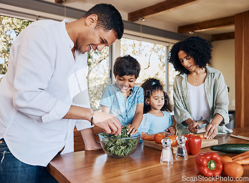 Image of Cooking, health and help with family in kitchen for learning, food and nutrition. Wellness, teaching and vegetable with parents and children at home for meal prep, support and dinner together