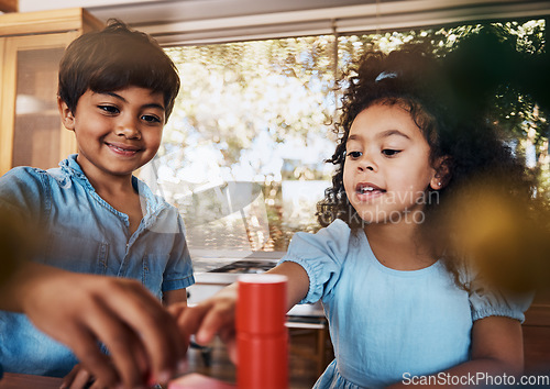 Image of Girl, boy and kids learning with building blocks in home for education, development and playing puzzle games for growth. Children, play and montessori toys for educational game and creative teaching