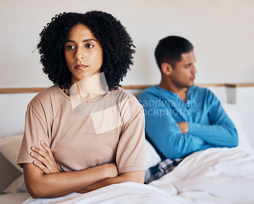 Image of Frustrated couple, fight and conflict in breakup, argument or disagreement on bed from dispute at home. Upset woman and man in divorce, cheating affair or toxic relationship in bedroom at the house