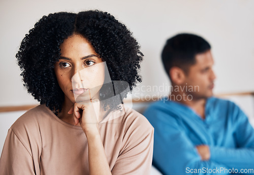 Image of Frustrated couple, fight and conflict in divorce, argument or disagreement on bed from dispute at home. Upset woman and man in breakup, cheating affair or toxic relationship in bedroom at the house