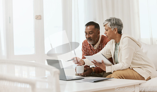 Image of Mature couple, laptop and budget with documents in home for financial planning, banking and account administration. Man, woman and review finance bills, savings and investment on computer in lounge