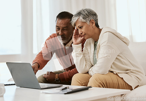 Image of Frustrated senior couple, laptop and financial crisis in debt, mistake or discussion on expenses or bills at home. Mature man and woman in finance, struggle or stress in budget planning on computer