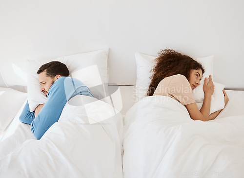 Image of Divorce, ignore and angry couple in bed after fight, argument or dispute in their home from above. Marriage, stress and top view of frustrated man and woman in a bedroom with crisis, fail or conflict
