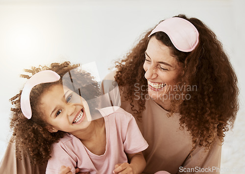 Image of Mother, daughter and sleep mask, happiness and bonding with love, care and laughter in the morning. Woman, young girl and smile at home with pajamas and family, positivity and fun together in bedroom