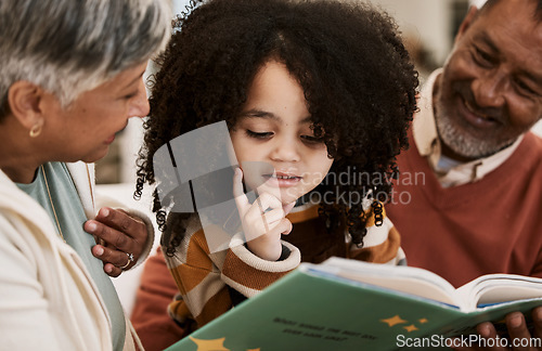 Image of Grandparents, child and reading with book, home and thinking with support, learning and education. Senior man, woman and young kid with story, teaching and helping for development in family house