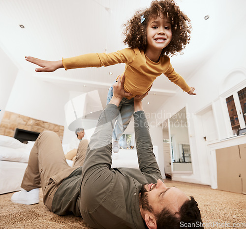 Image of Father, child and airplane game on floor in home living room, bonding and love for care, relax or smile. Dad, girl kid or lift for plane, playing or happy on lounge carpet, portrait and family house
