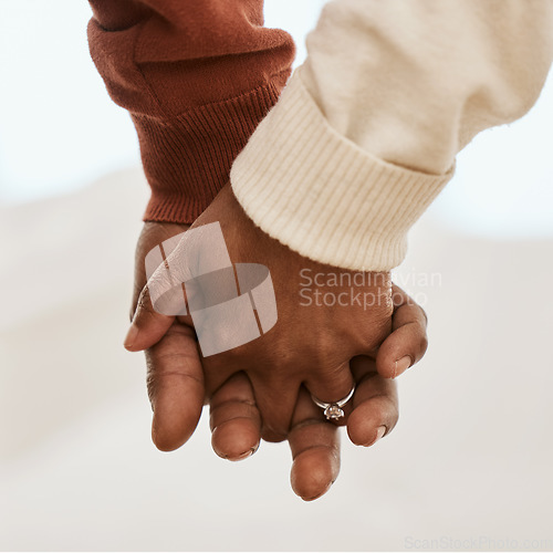 Image of Closeup, love and a couple holding hands for support, marriage trust and gratitude. Respect, comfort and a man and woman with affection, care or a gesture for romance together in a relationship