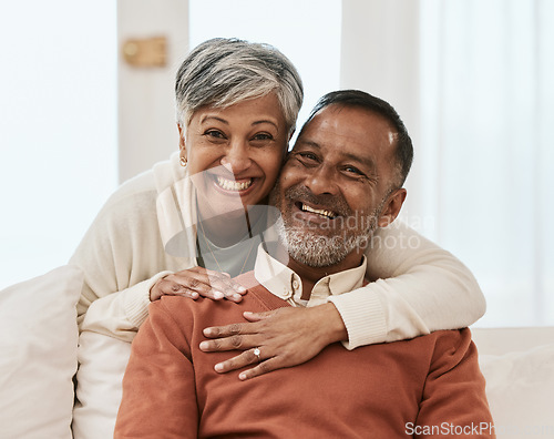 Image of Smile, portrait and senior couple hug on sofa in living room relax, laugh and bond in their home. Face, smile and old man embrace elderly woman in a lounge with love, satisfied and enjoy retirement