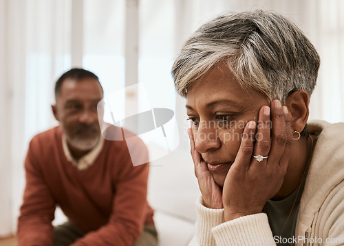 Image of Divorce, crisis and senior couple on sofa with problem, fail or angry, argument or dispute at home. Marriage, stress and annoyed man with woman in living room for depression, abuse or cheating guilt