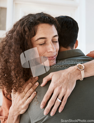 Image of Happy, trust and a couple hugging in their home for support, care or romance in marriage together. Peace, love and security with a woman embracing her husband in their house for relationship bonding