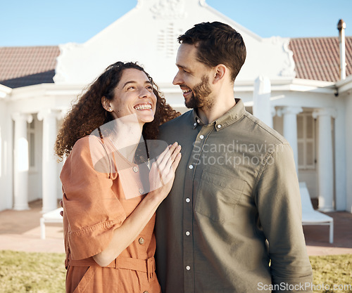 Image of Happy, couple and hug outdoor of new house, real estate and moving to residential property for rental. Man, woman and homeowner smile in garden for investment, mortgage finance and dream neighborhood