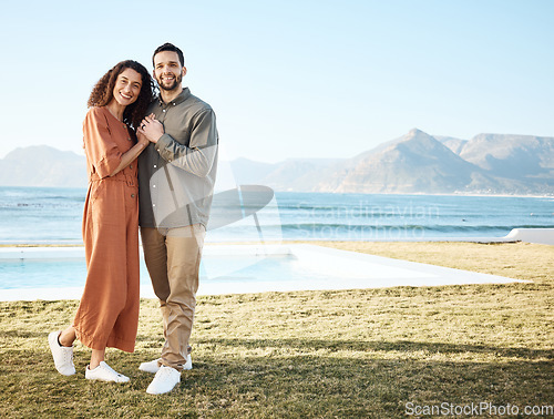 Image of Couple, house pool and portrait with love, garden and happy from travel by the ocean. Smile, hug and gratitude from a woman and man together with care on vacation and relax at new holiday home