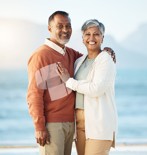 Image of Senior couple, beach portrait and smile with hug, care and bonding for love, romance and vacation by sea. Mature man, woman and together with marriage, trust and sunshine on holiday in Indonesia