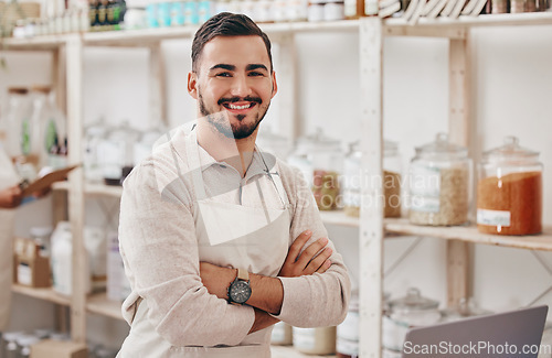 Image of Supermarket, grocery store and portrait of man with crossed arms for service in organic startup. Small business, sustainable shop and manager smile for groceries, vegan products and natural food