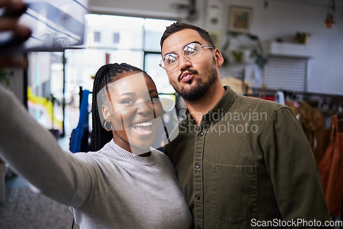 Image of Couple, bond and selfie of people in clothing store for profile picture, social media and blog on internet. Diversity, man and happy black woman take photo in shop for connection and fun memory