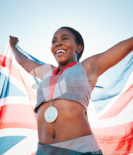 Image of Fitness, winning and black woman with achievement, UK flag and sports with competition, victory and champion. African person, athlete or winner with British symbol, pride and medal with celebration