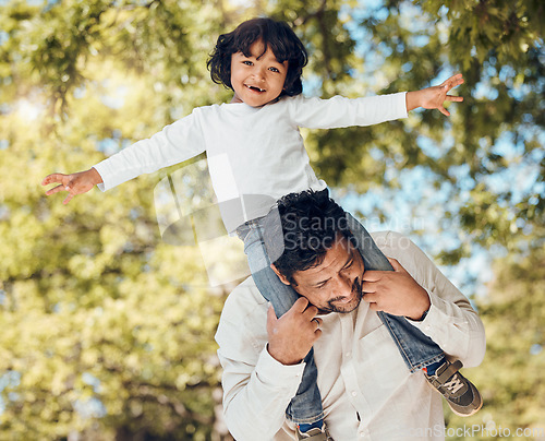 Image of Father, portrait or piggyback with child in park for fun bonding, games or energy in backyard garden. Smile, airplane or playing dad carrying boy kid with parent, family or support activity in nature