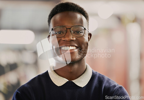 Image of Student, university and portrait of black man for education, learning and excited for future career on campus. Face of African person in library with glasses for research, school project and studying