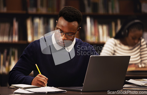 Image of Student, man and writing in library for studying, research and planning in university, scholarship and education. African person with online test and computer for language, e learning or philosophy