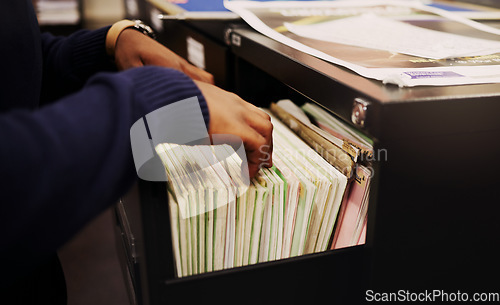 Image of File cabinet, legal documents and person hands with management of tax report at office. Accountant, worker and notes in a workplace for corporate audit and paperwork documentation for debt books