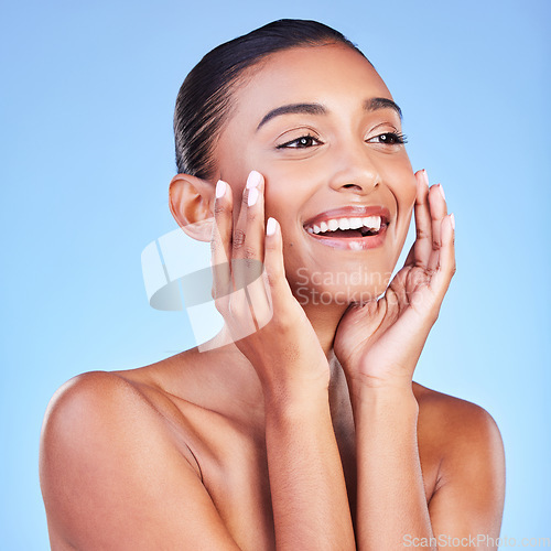 Image of Beauty, smile and skincare with face of woman in studio for cosmetics, dermatology and facial. Glow, self care and wellness with person on blue background for spa treatment, grooming and makeup
