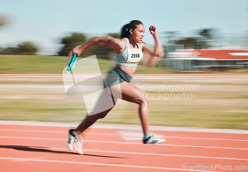 Image of Fast, race and athlete running relay sprint in competition or fitness game or training for energy wellness on a track. Sports, stadium and athletic person or runner exercise, speed and workout