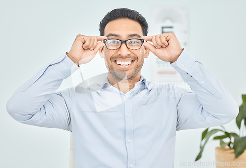 Image of Happy man, portrait or glasses for vision, eye test or optometry in clinic wellness, health or prescription frames. Person, face or Mexican customer in optician, ophthalmology or eyesight assessment