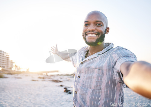 Image of Selfie, beach and man with a smile for travel, social media and profile picture with freedom. Sea, African male person and portrait with photo with vacation and holiday influencer post on Miami trip