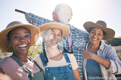 Image of Farmer, women and selfie in countryside with comedy and scarecrow outdoor with a smile. Diversity, worker group and portrait with social media and profile picture on a agro farm with sustainability