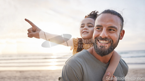 Image of Beach, sunset and father carrying his child for a walk on a family summer vacation or holiday. Adventure, explore and girl kid pointing at the view and bonding with dad by the ocean on a weekend trip