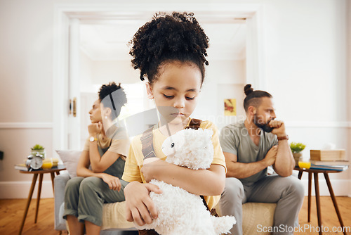 Image of Divorce, fight and sad boy child with teddy bear in a living room for stress, support and comfort at home. Family, crisis and kid with anxiety for toxic parents, argue or dispute, depression or fear