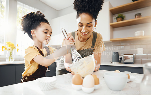 Image of Child, mom and baking in kitchen, helping and learning with support, development and breakfast. Home, cooking and boy chef with happy mother teaching, mixing bowl for whisk and eggs recipe in morning