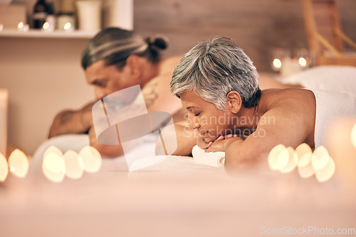 Image of Relax, massage and couple on bed in spa for holiday, vacation and anniversary celebration. Love, luxury resort and mature man and woman sleeping in salon for beauty, therapy and skincare treatment