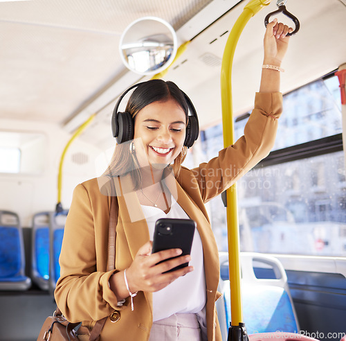 Image of Bus, woman and phone headphones with public transport, social media scroll and smile with commute. Travel, music and internet app of a female professional on a mobile with networking on metro