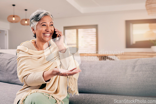 Image of Phone call, happy senior woman and living room with conversation and communication in a home. Retirement, elderly female person and mobile discussion on a lounge sofa with contact and chat on couch